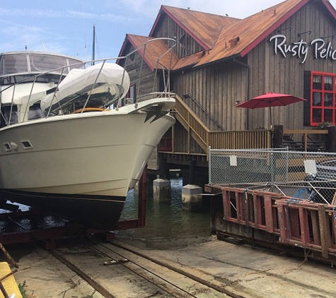 RAZORS EDGE DIVE CO. - Long Beach, CA. Slapping on some bottom paint