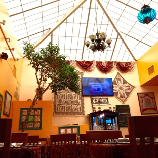 Shamshiri Glendale - Glendale, CA. Central atrium dining area with vaulted alabaster glass skylight. They also have patio seating.