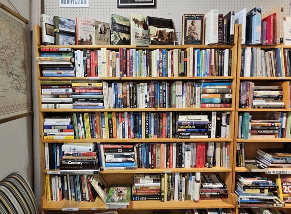 Joy of Books - Hendersonville, NC. Bill Lewis of Vero Beach, Florida, checking out the Joy of Books while visiting Hendersonville, North Carolina.