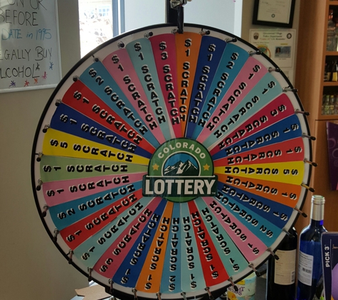 Lyons Den Liquor - Greenwood Village, CO. Spend 5$ and win free lottery ticket with ticket wheel