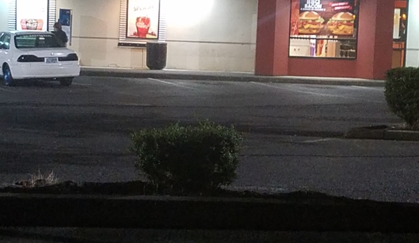 Jack in the Box - Happy Valley, OR. Here she is smoking with her boyfriend and not caring about all the cars coming in wanting food and having to turn around.