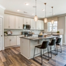 Eastwood Homes at the Bluffs at Pinefield Townhomes - Home Builders