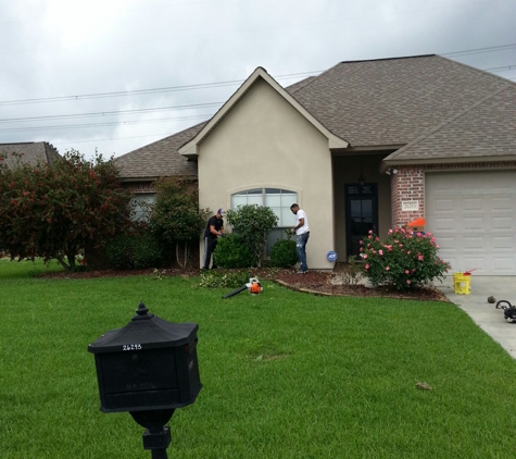 Servicare Lawn Maintenance - Livingston, LA. Lots of rain latley so flower beds here we come