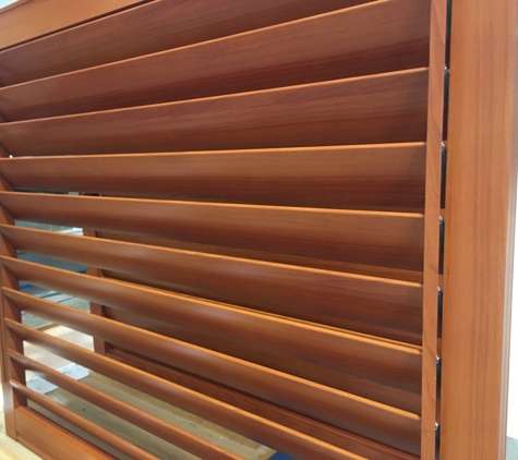 WOODonALI - Molendinar, QLD. wood look aluminium shutters