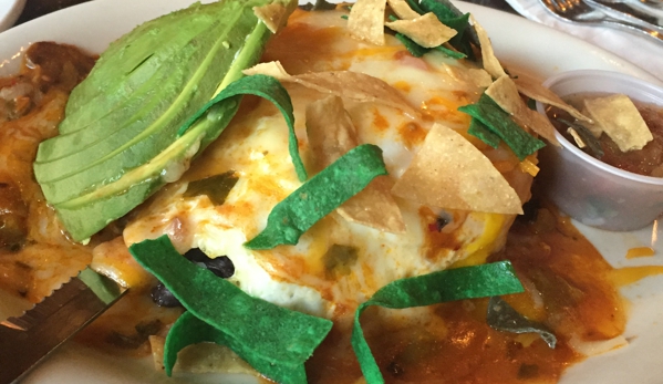 Foxy's Restaurant - Glendale, CA. Leaning tower of Mexico! Eggs tortillas rice and beans and cheese and avocados