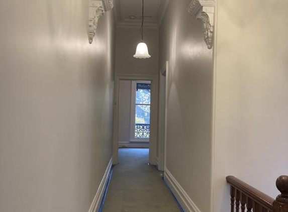 PERFECTION PAINTERS & DECORATORS - Bentleigh East, VIC. Plaster repair on arch and walls.