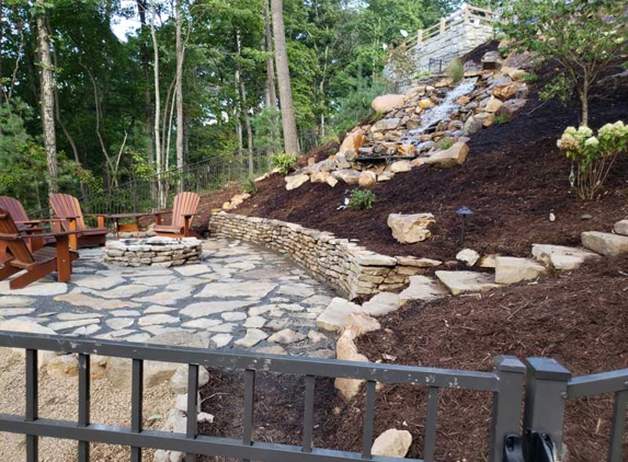 Greenscapes Landscaping & Retaining Walls - Candler, NC. waterfall and boulder steps