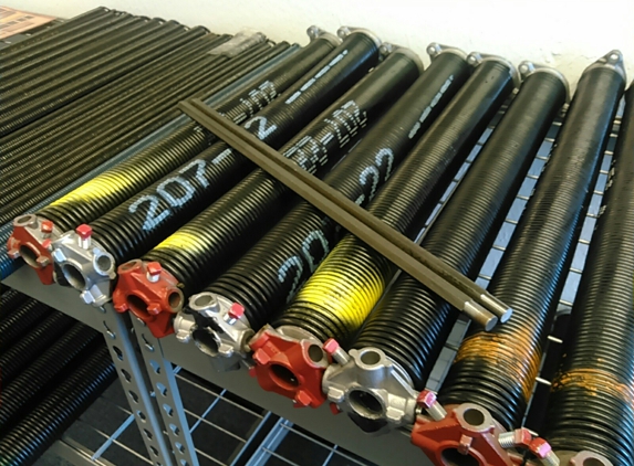 Spectrum Overhead Door- DISCOUNT CO.. Garage door torsion springs