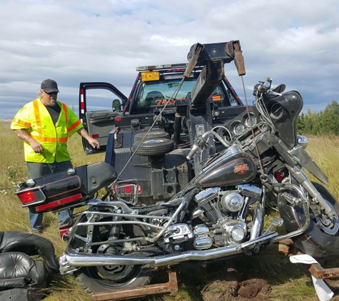 1st Class Towing & Recovery - Anchorage, AK. He lived