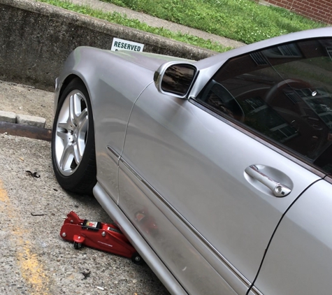 Anthony's Towing - Shepherdsville, KY. Towing vehicle on jack stand